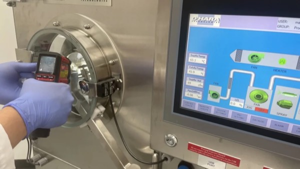 Tablet coating pan at a cGMP dietary supplement manufacturer